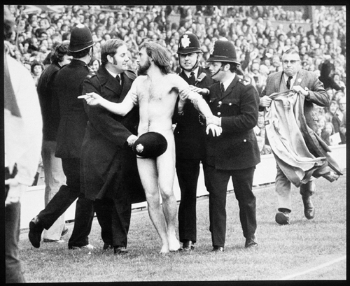 During England-France rugby match at Twickenham in February 1974, an Australian accountant, dashed naked before a crowd of 53,000, including Princess Alexandra. Constable Bruce Perry took off his helmet to cover O'Brien's private parts